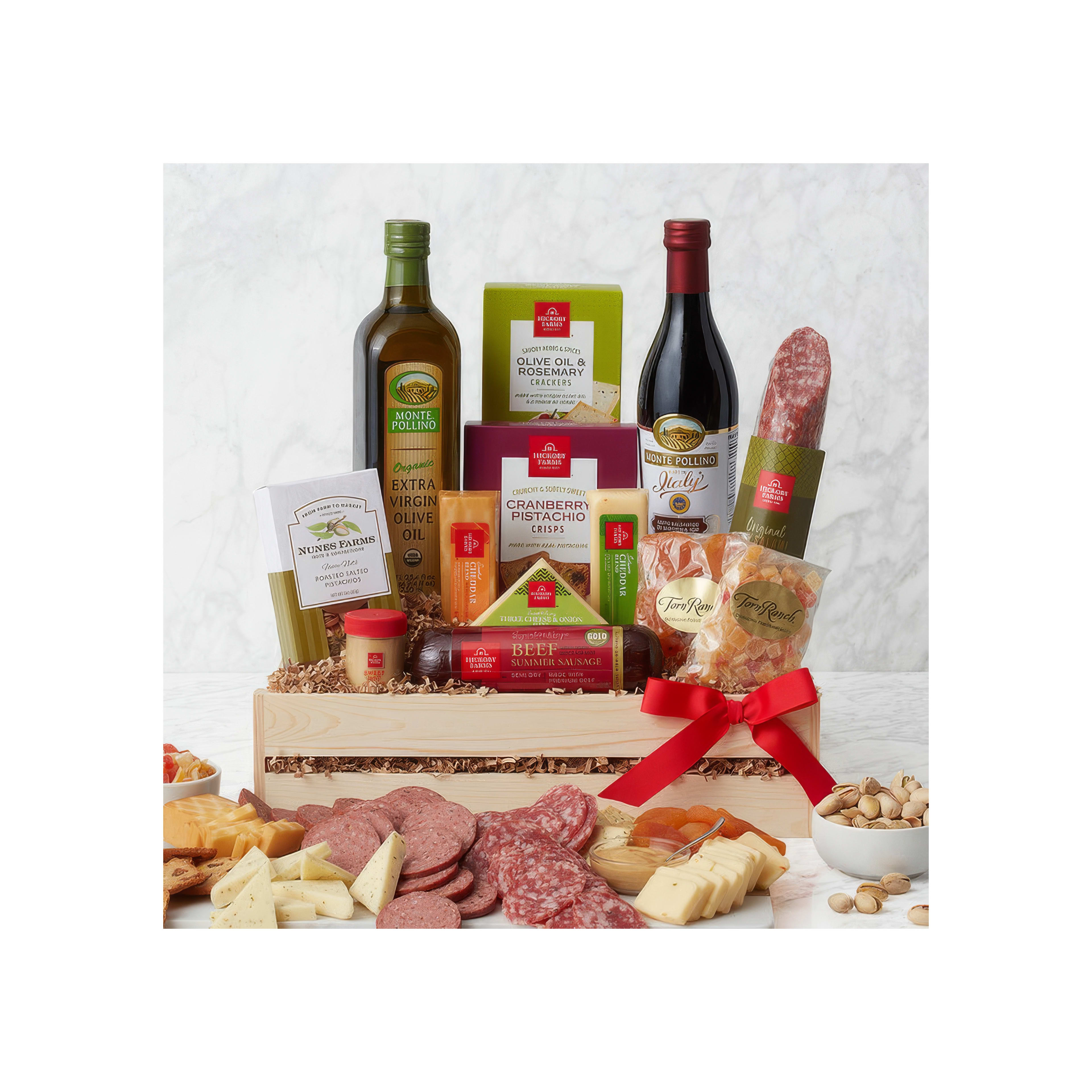 A gorgeous gift basket with gourmet snacks, oils, meats, and cheeses for festive occasions.