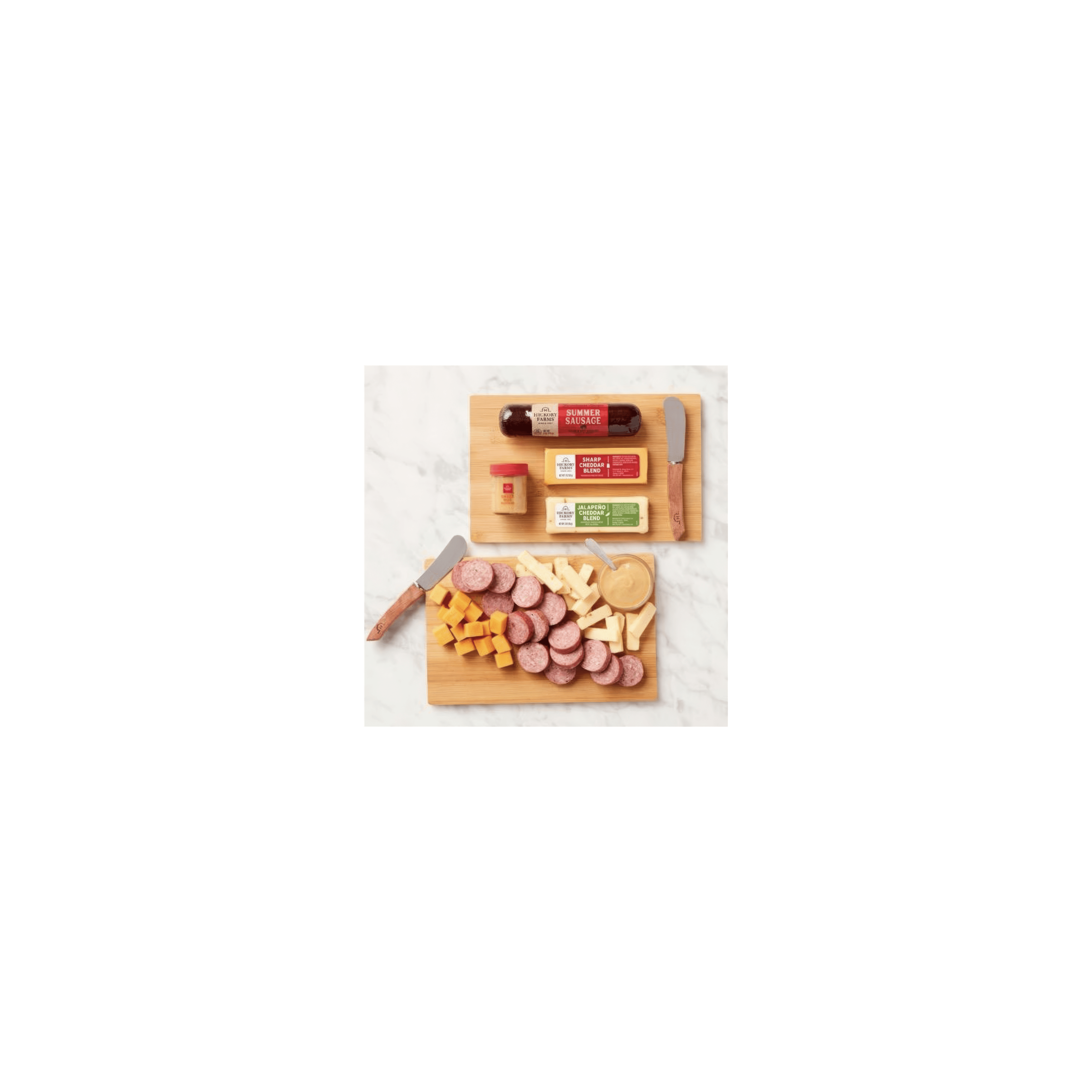 A variety of sliced meats and cheeses are arranged beautifully on wooden boards.