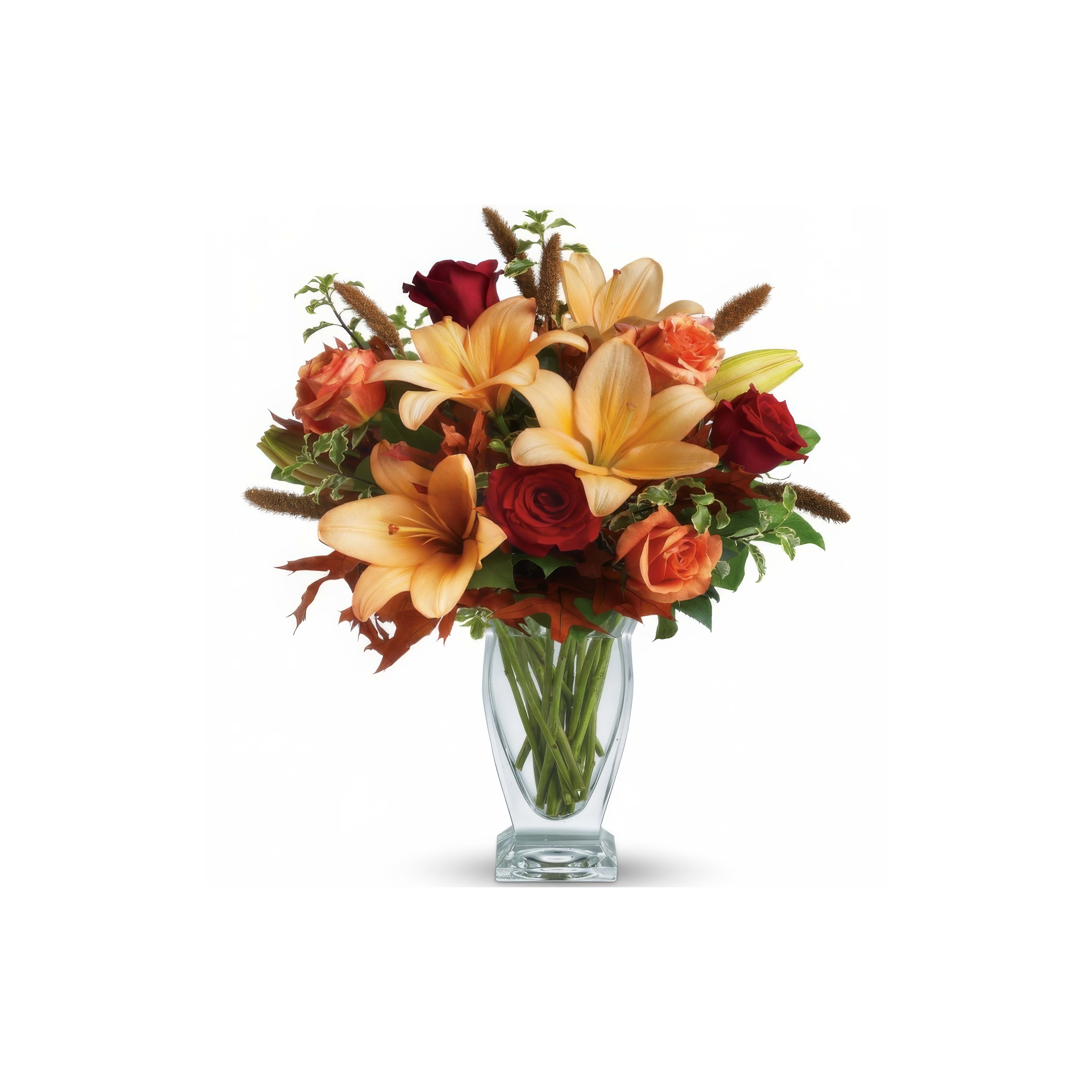 Vibrant bouquet of orange lilies and red roses with fresh greenery.
