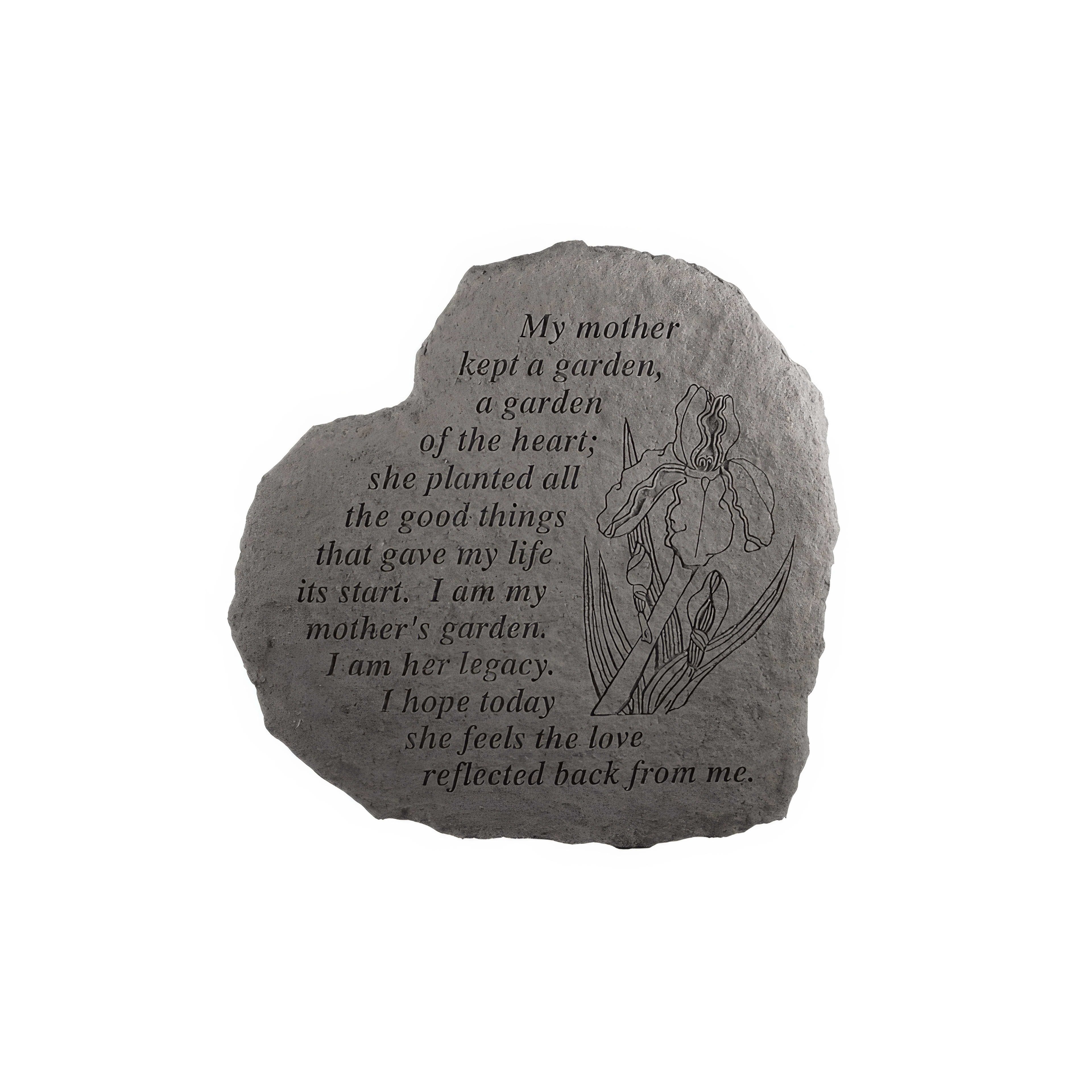 A heart-shaped stone features a touching message about a mother's love and the garden she tended.