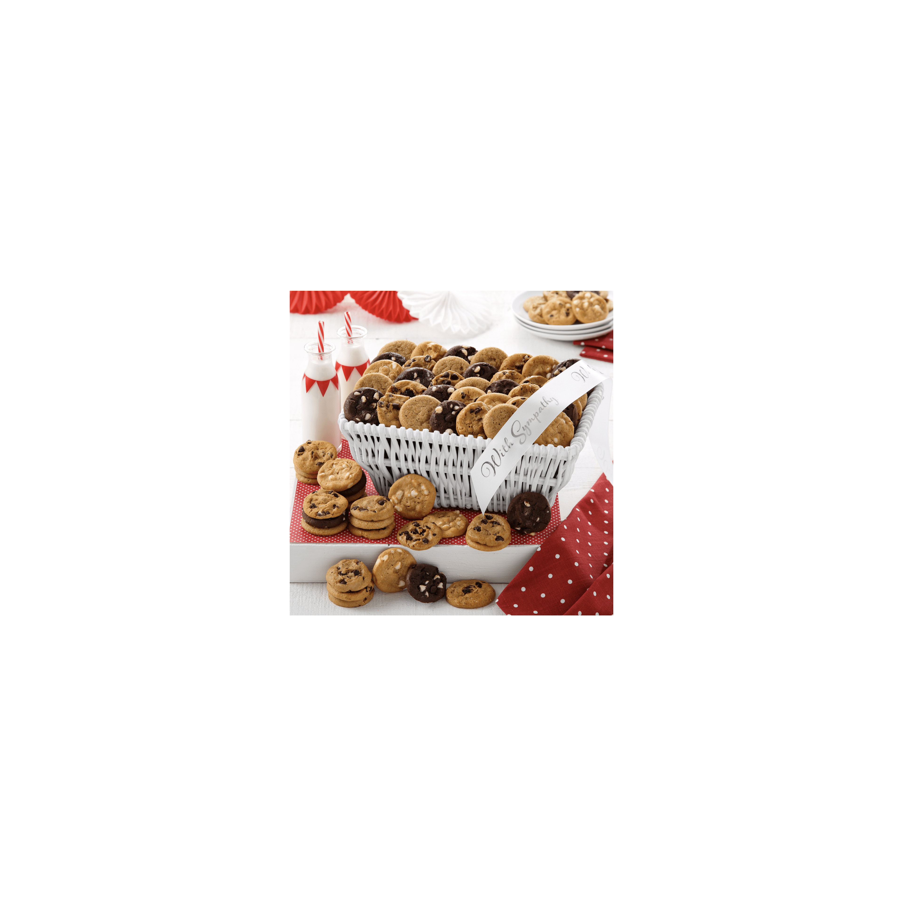 A large basket filled with assorted cookies sits next to milk bottles, perfect for sharing.