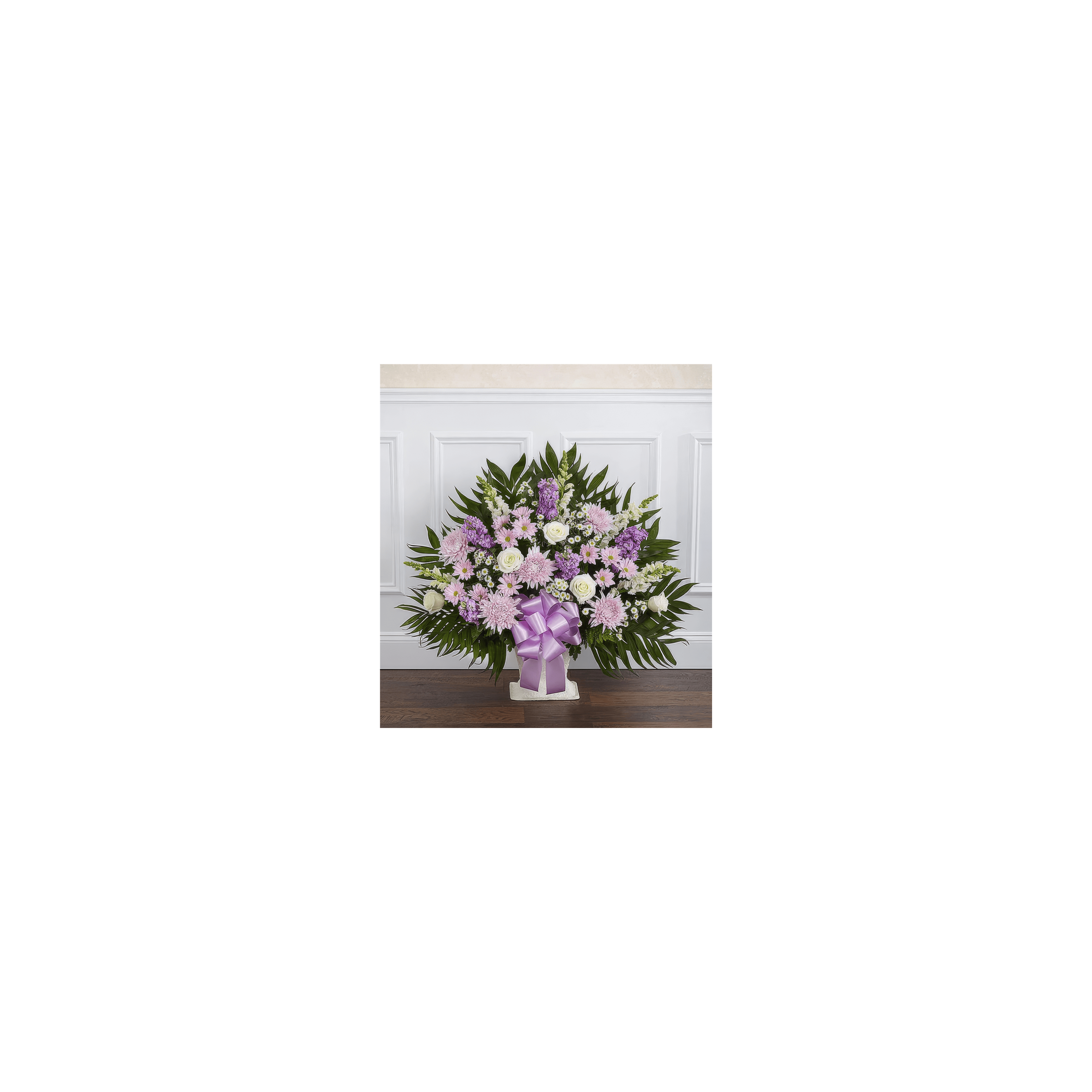 A stunning arrangement of purple and white flowers, ideal for any occasion indoors.