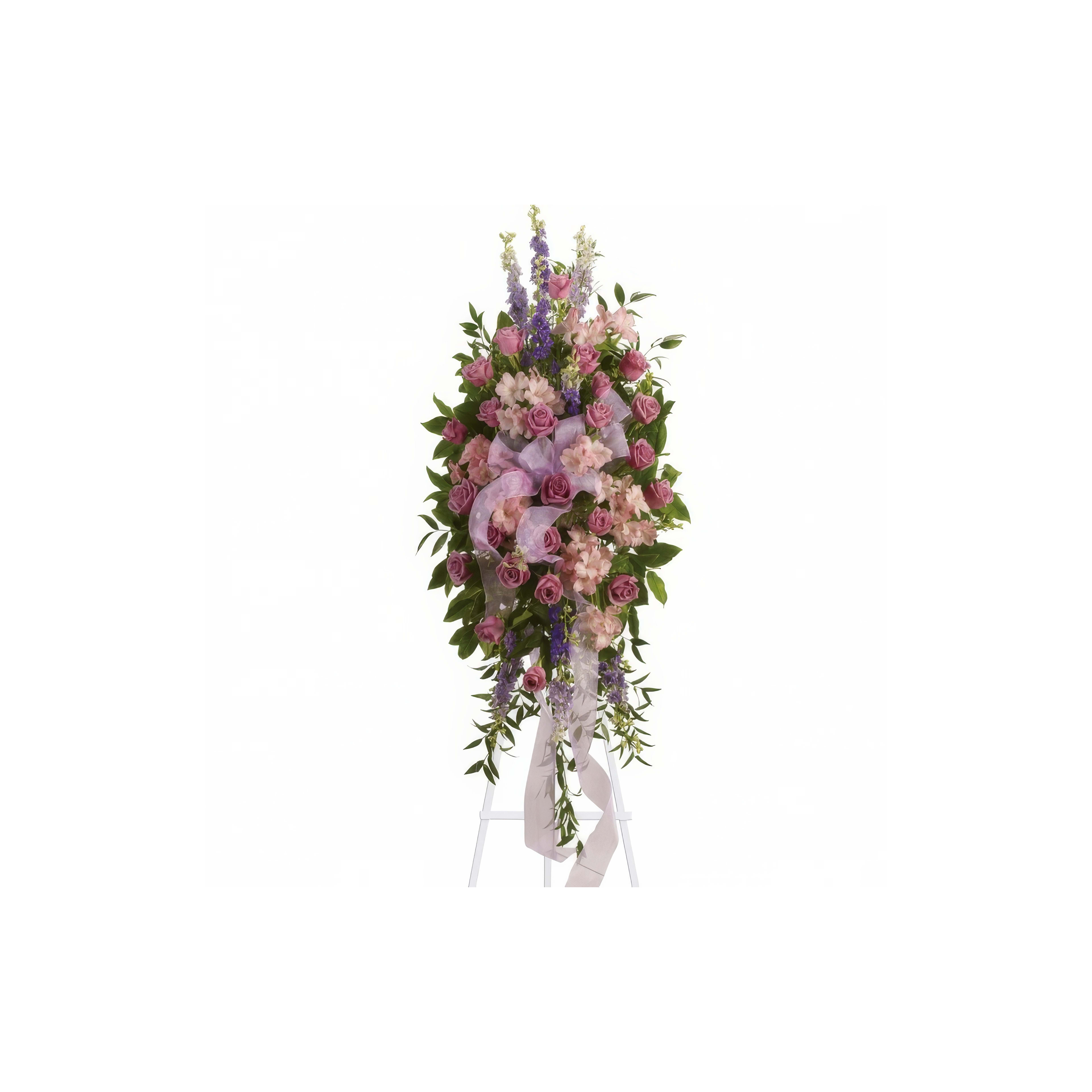 A beautiful floral arrangement features vibrant pink roses and purple blooms in memory.
