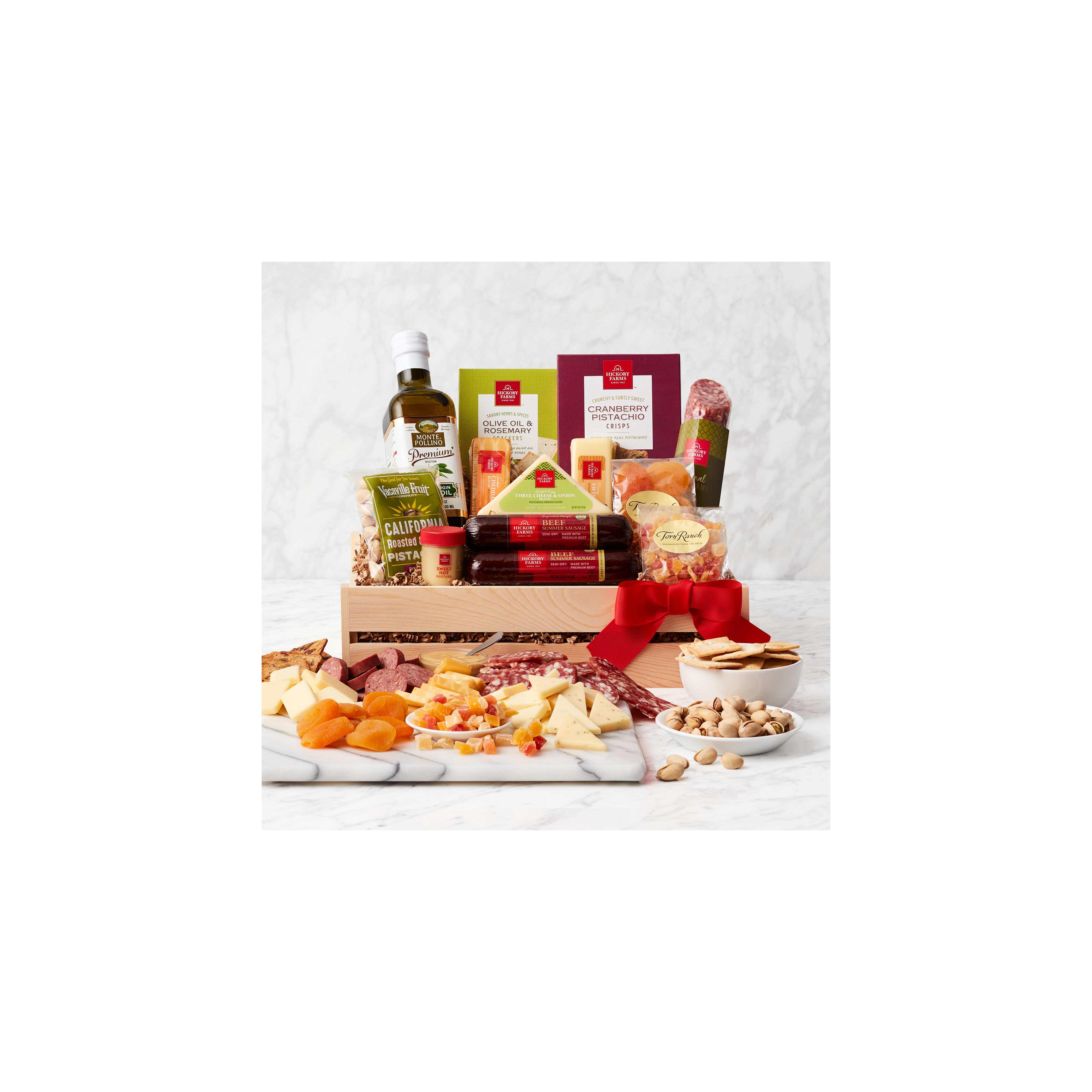 A lovely basket of cheeses, cured meats, nuts, and dried fruits, ideal for sharing!