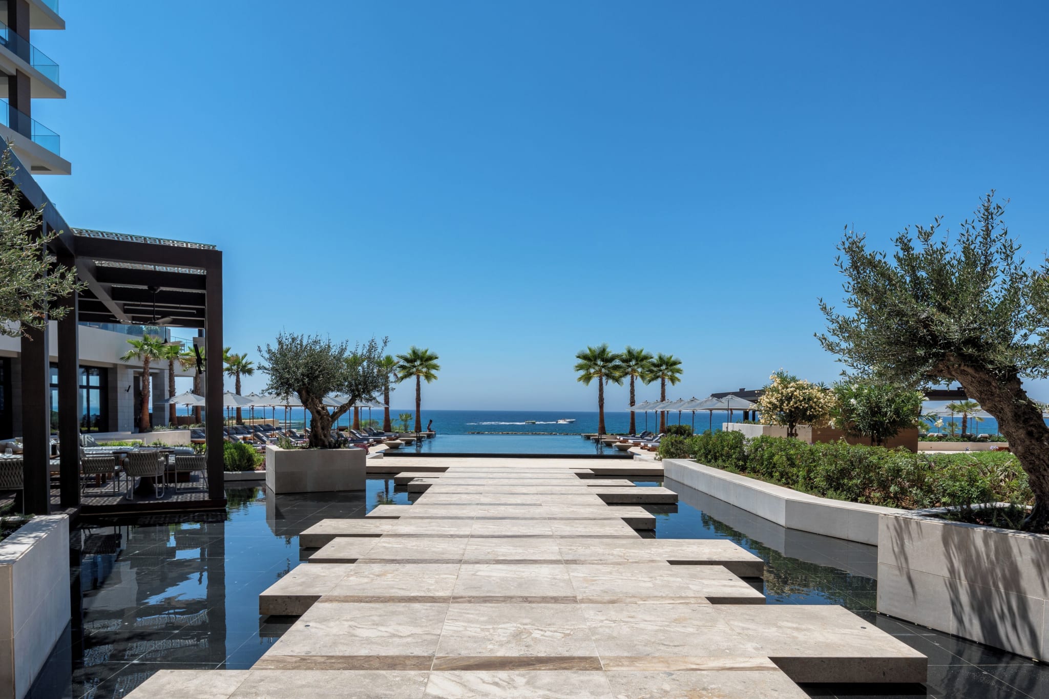 Pool and boardwalk facing the sea at Amara in Limassol, Cyprus