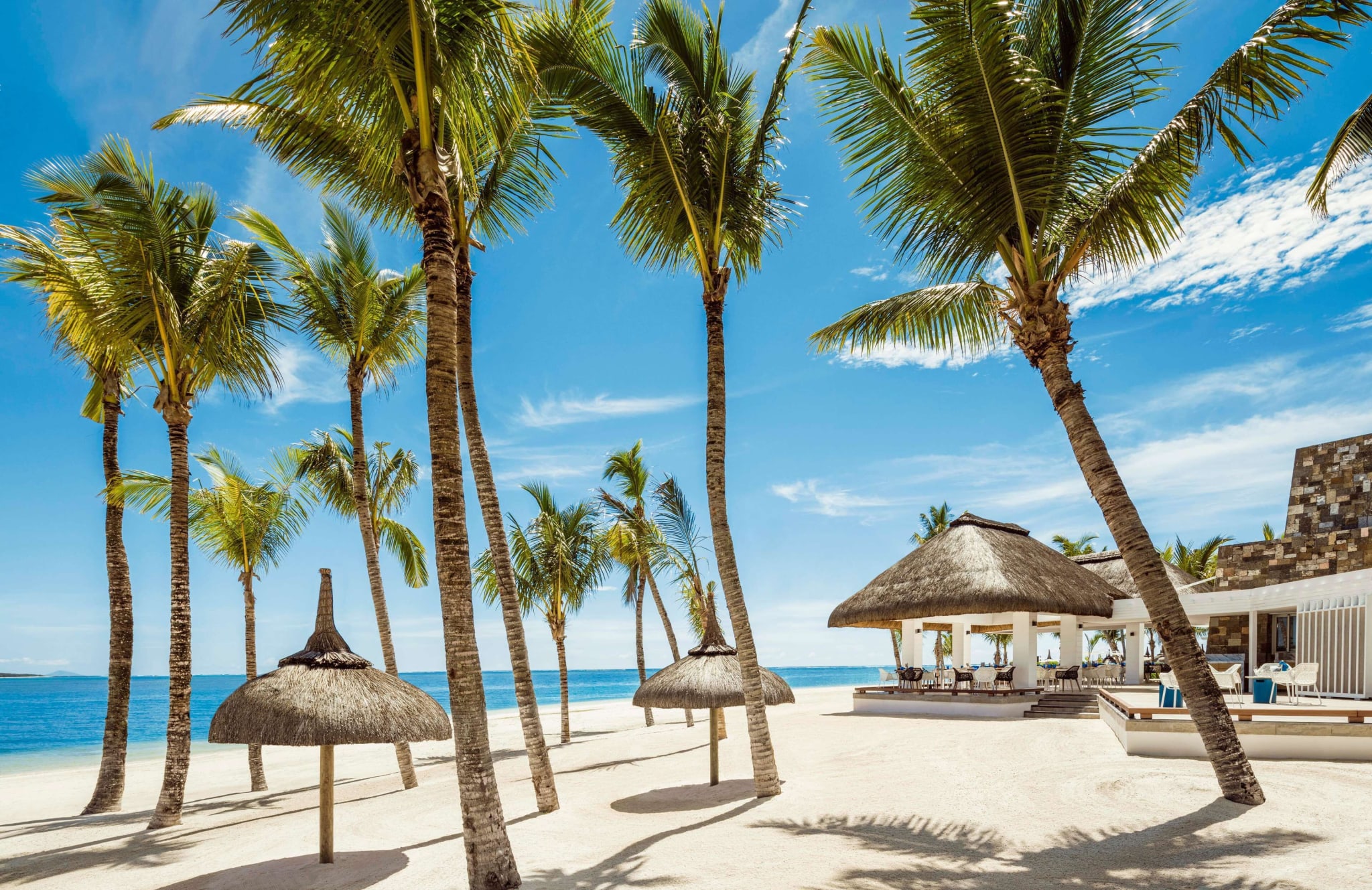 Palms and white sand at One&Only Le Saint Géran in Mauritius