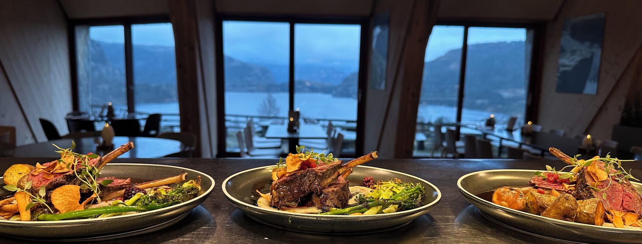 A meal with mountain and lake views at Preikestolen BaseCamp