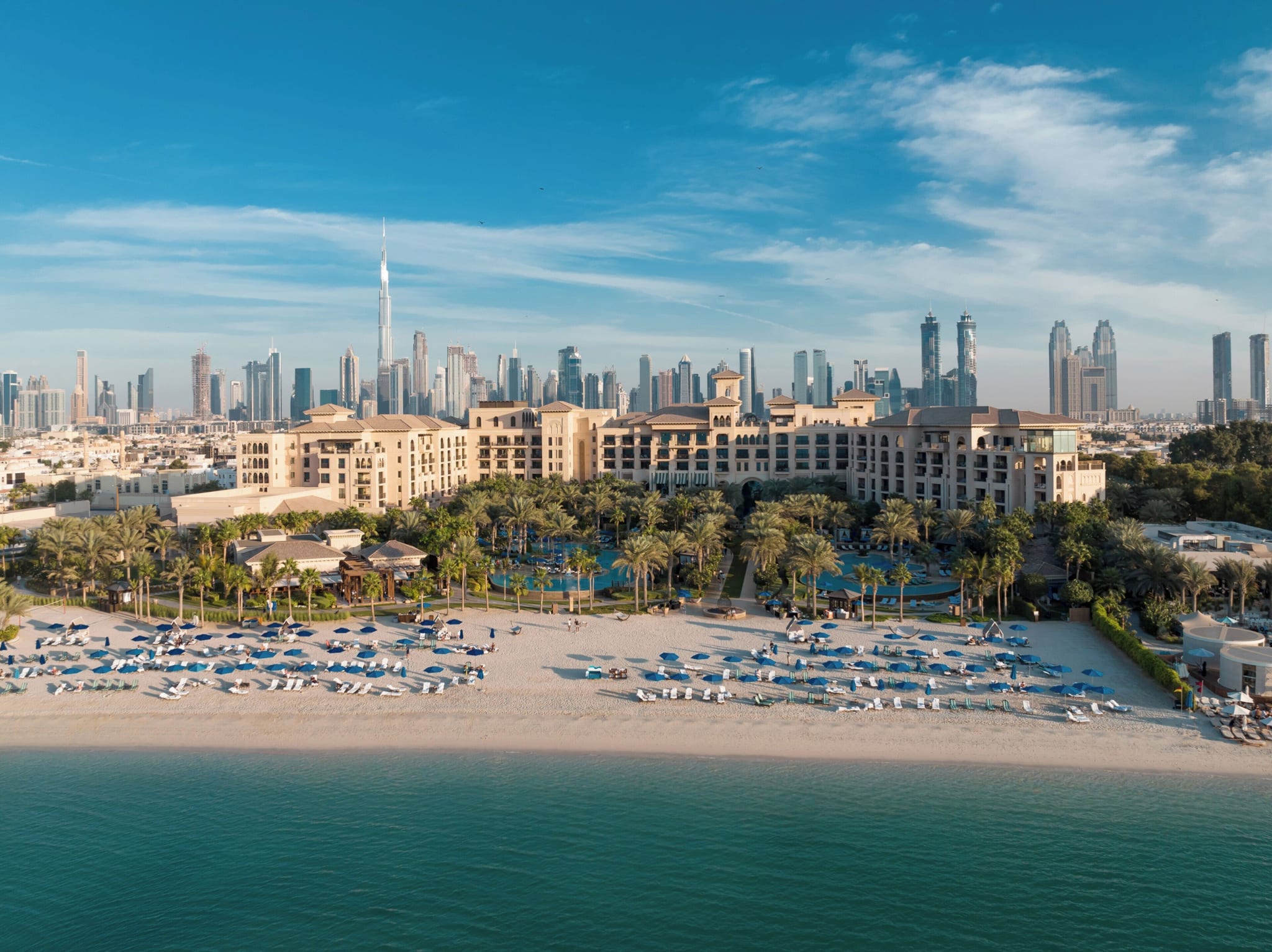 The beach at Four Seasons Resort Dubai at Jumeirah Beach with the skyline behind