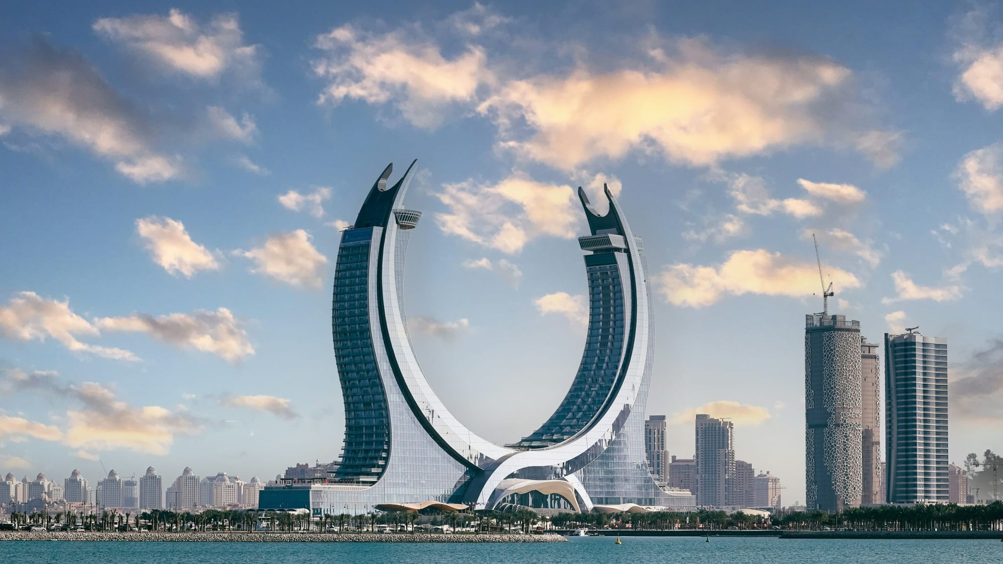 The crescent-shaped Katara Towers on the waterfront in Lusail, north of Doha