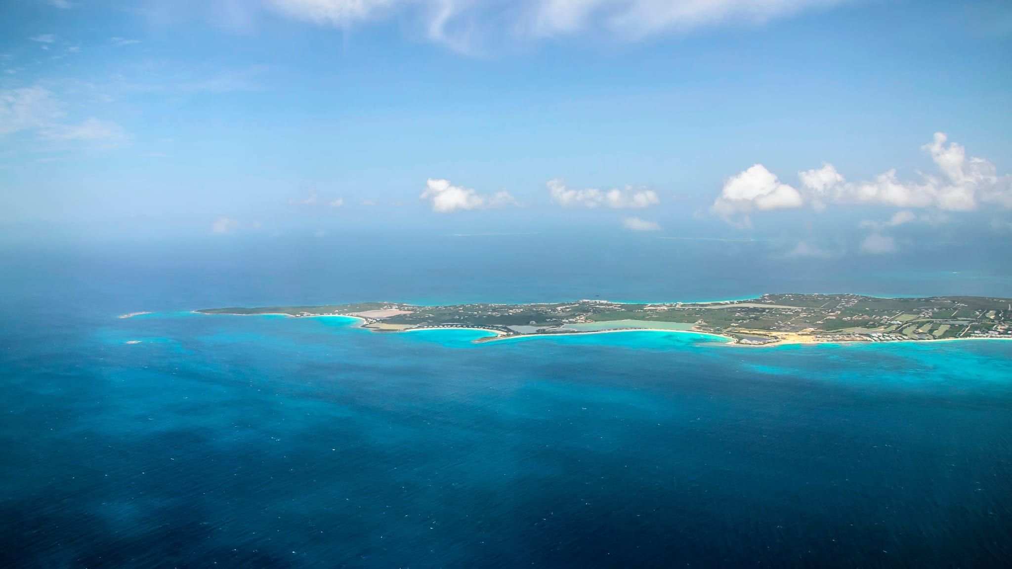 A small island in turquoise sea off Anguilla