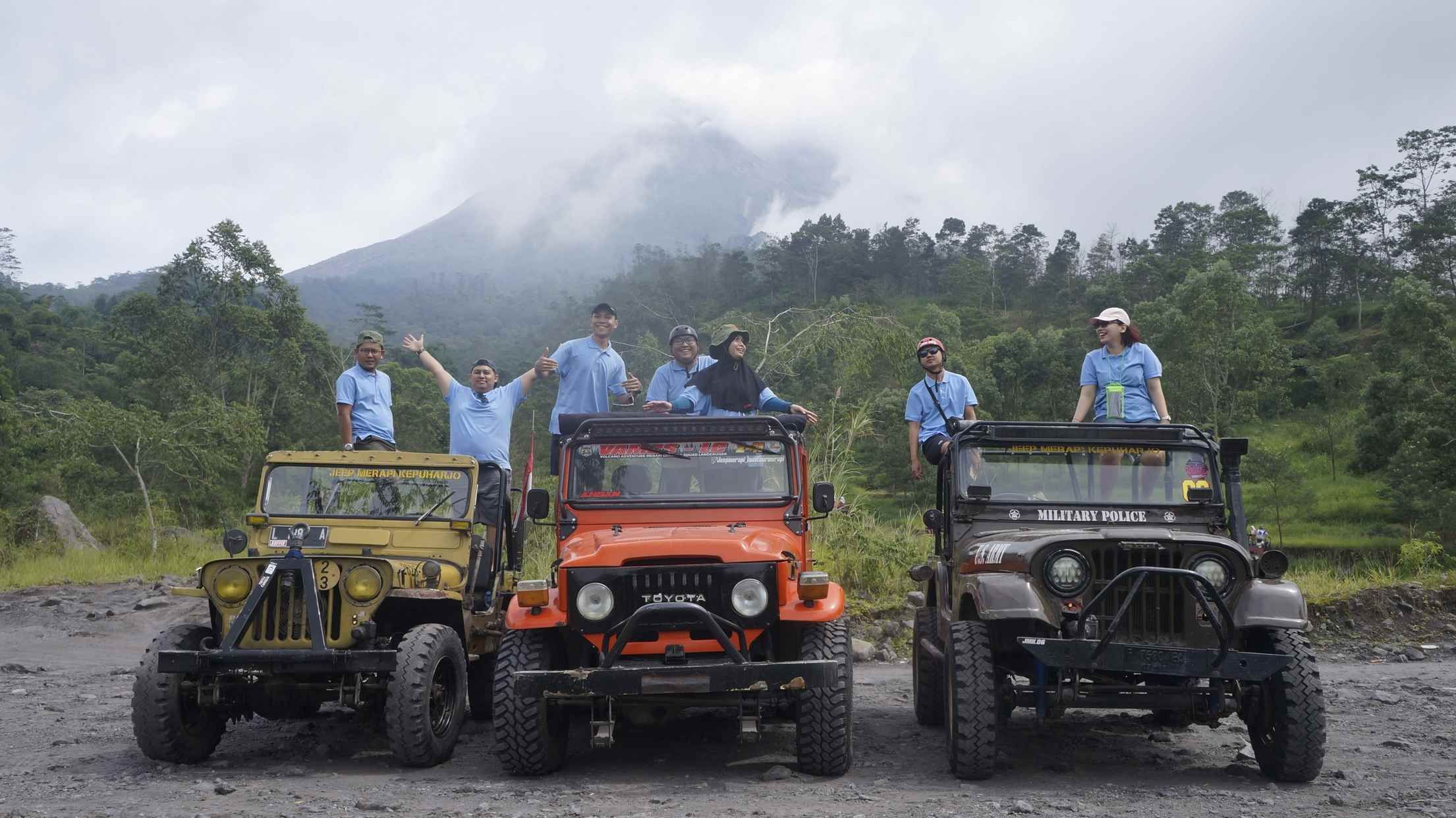 Jeep adventure on Mount Merapi slopes with volcano background