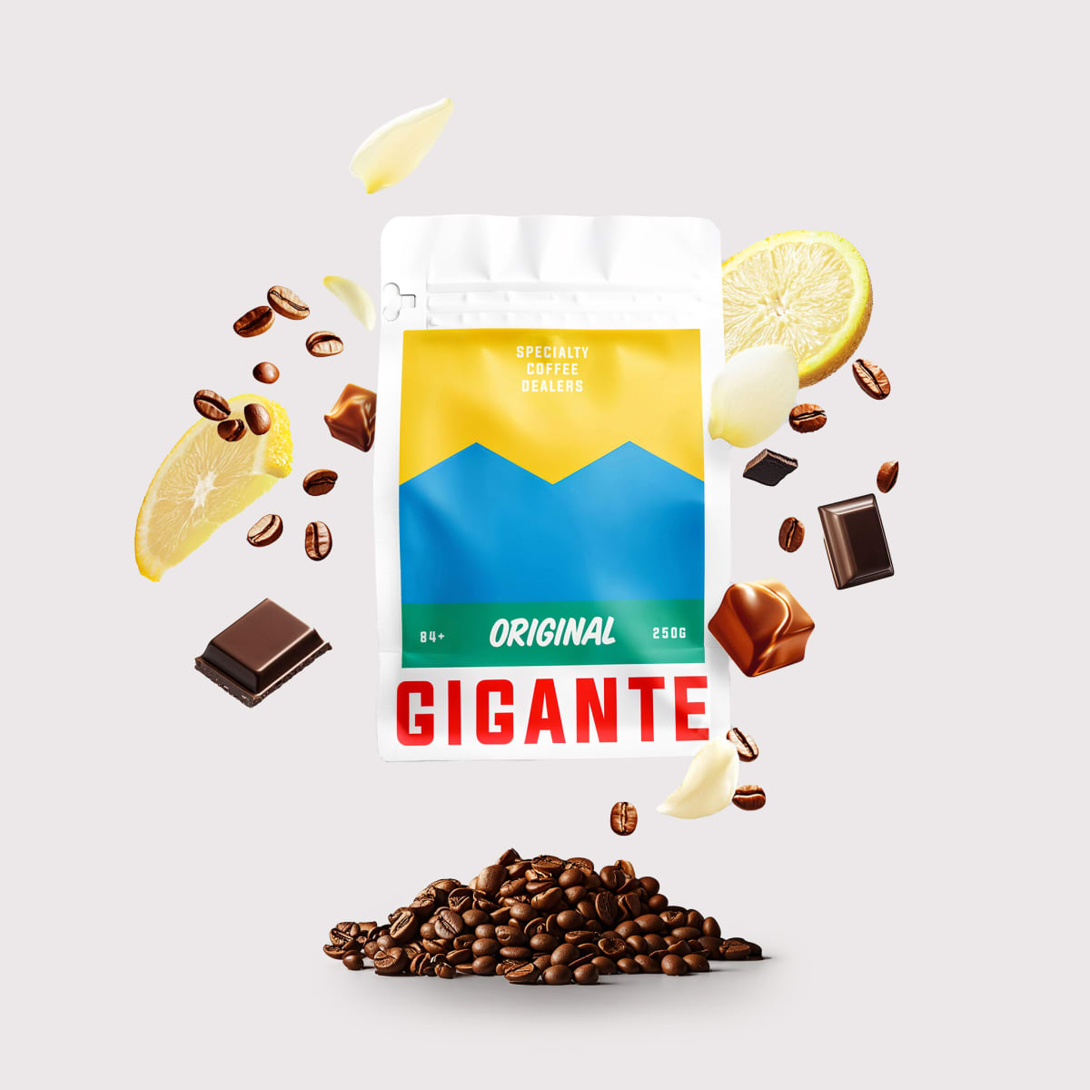 Gigante Original coffee bag with flying lemon slices, chocolate and beans on pale grey