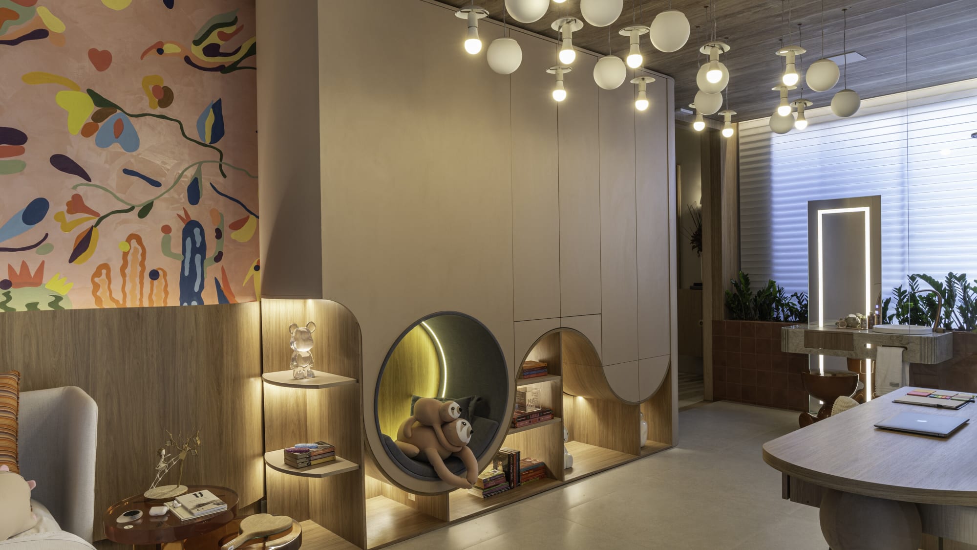 Oak arched reading nooks with plush toys and a globe pendant lamp cluster