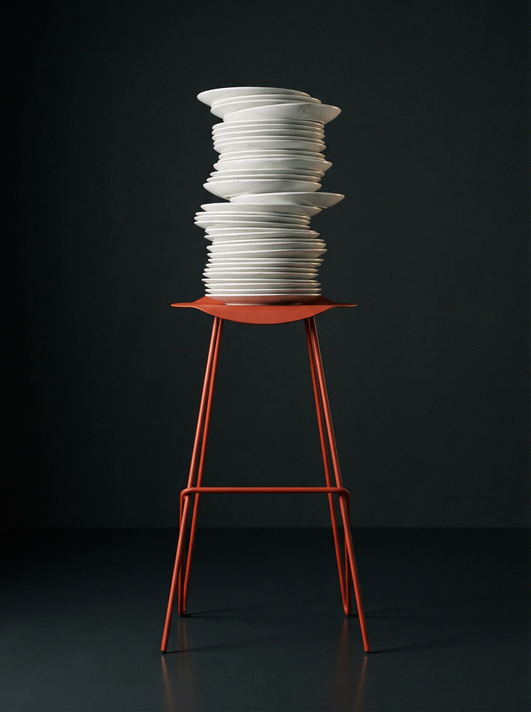 A tall stack of white plates balanced on an orange metal bar stool against black