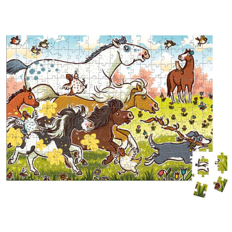 Innenansicht fertiges Puzzle mit farbiger Illustration von galoppierenden Ponys und Hund auf Wiese