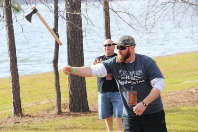 Man throwing hatchet