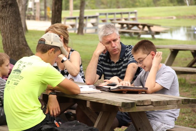 Family reading bible together