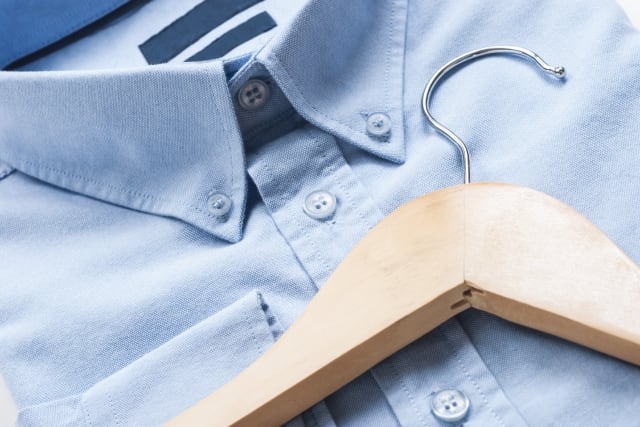 blue shirt and hanger