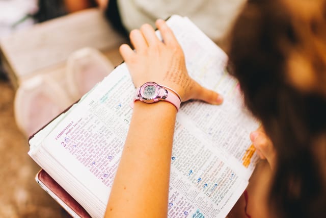 hand on Bible