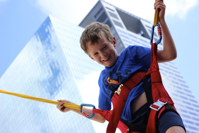 Camp in the city camper on bungee trampoline