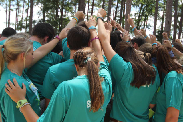 Pine Cove counselors praying