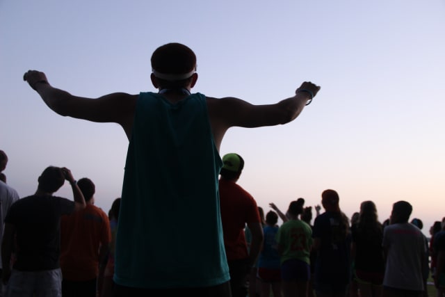 Camper Worshipping Jesus