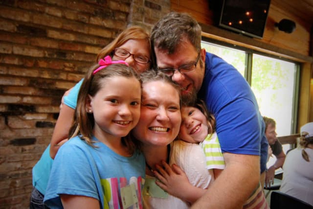 Family Hugging at Camp