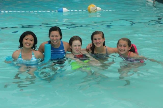 Girl campers in the pool