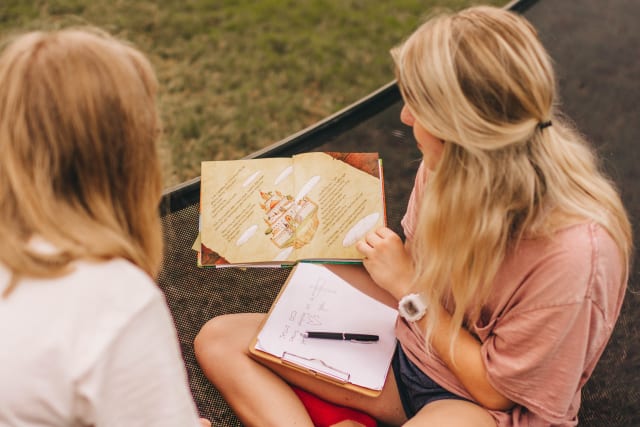 girl staff reading