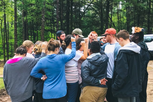 group praying together