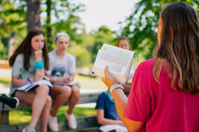 Business man meets with a college intern