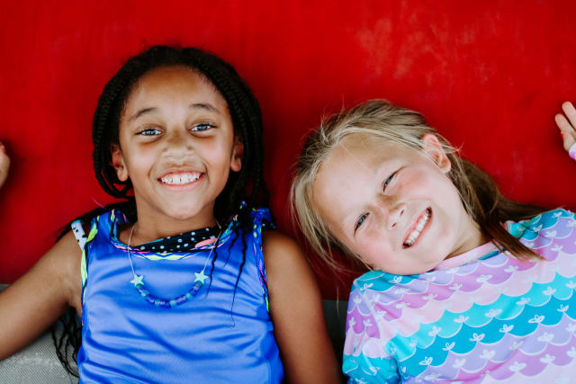 group of campers smiling together  