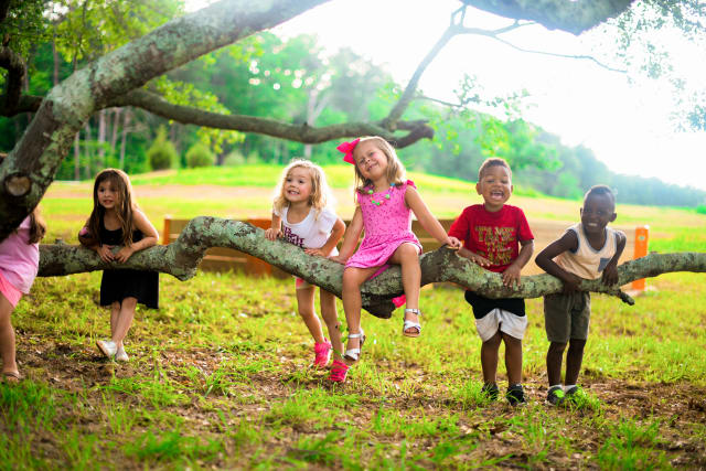 group of campers smiling together