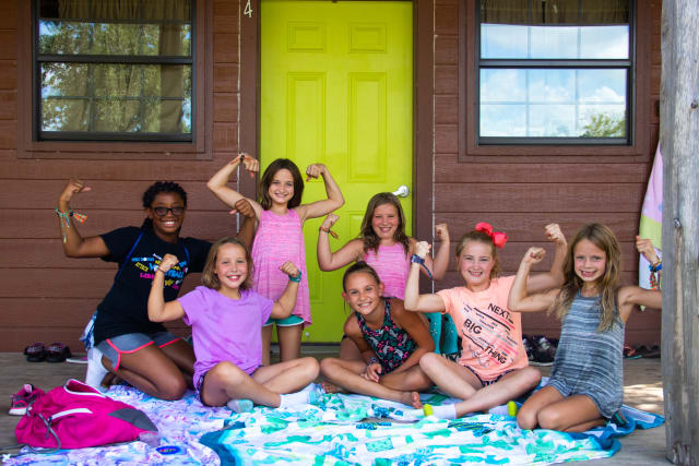 group of campers smiling together