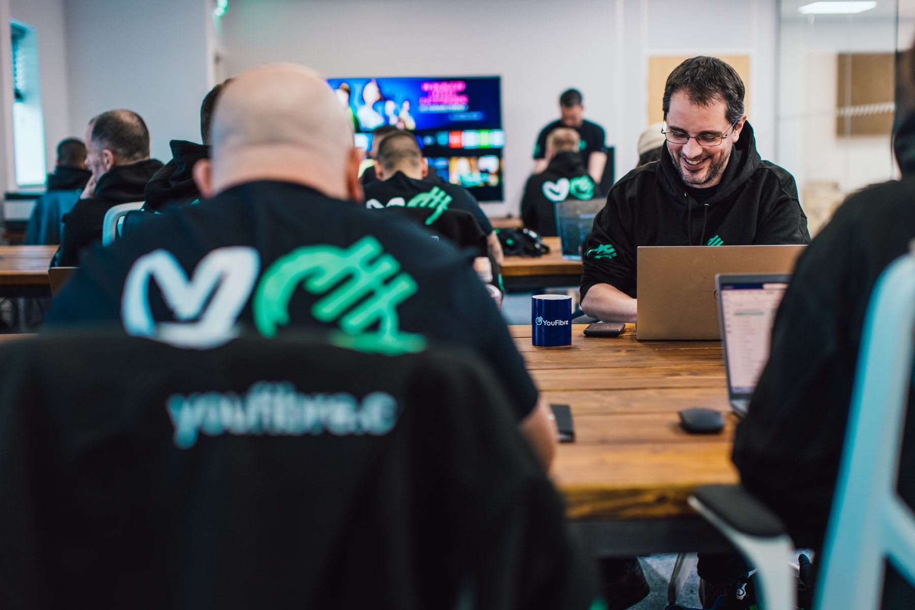 The YouFibre team at work in the office