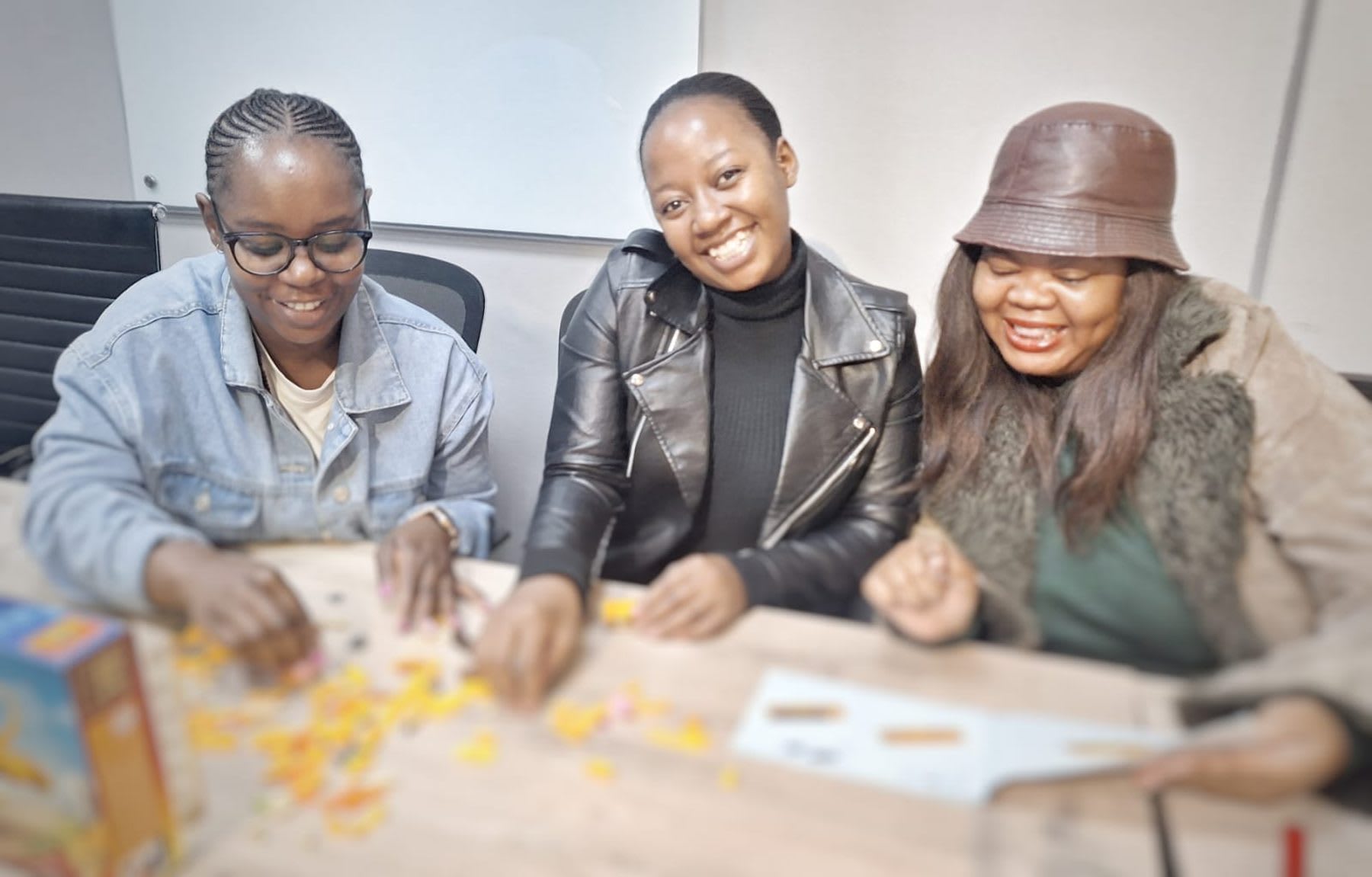 YouFibre colleagues working together at a table