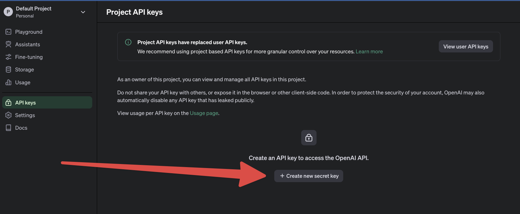 Screenshot of the OpenAI API keys management page with a red arrow pointing to the 'Create new secret key' button for generating new API keys.