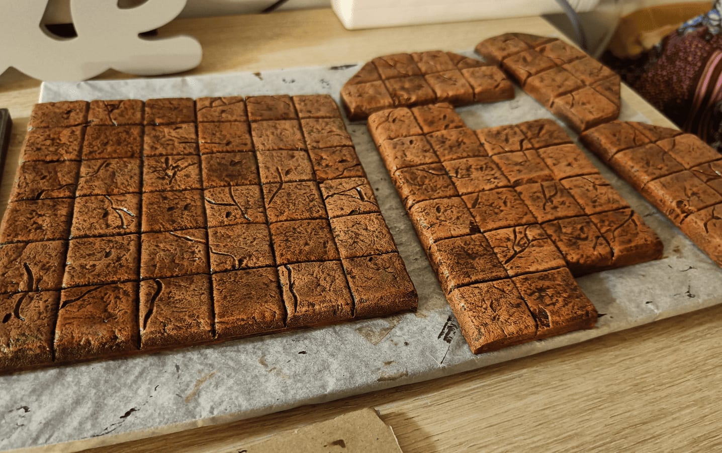 Orange painted tiles looking like cake just pulled from oven