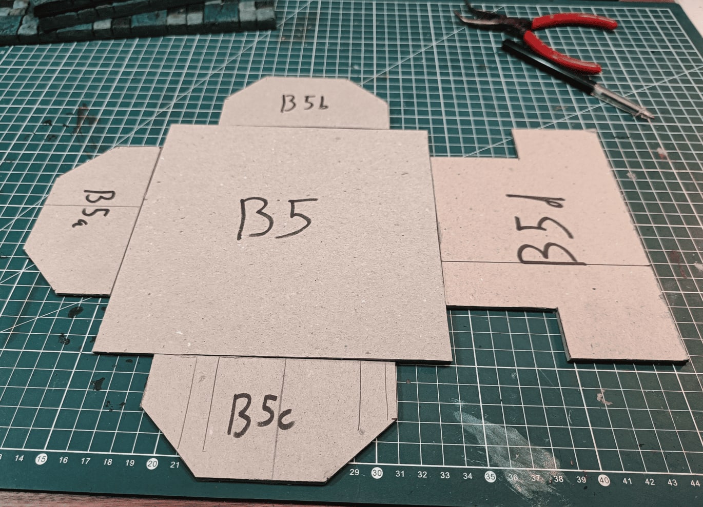 Room dimensions cut from cardboard templates