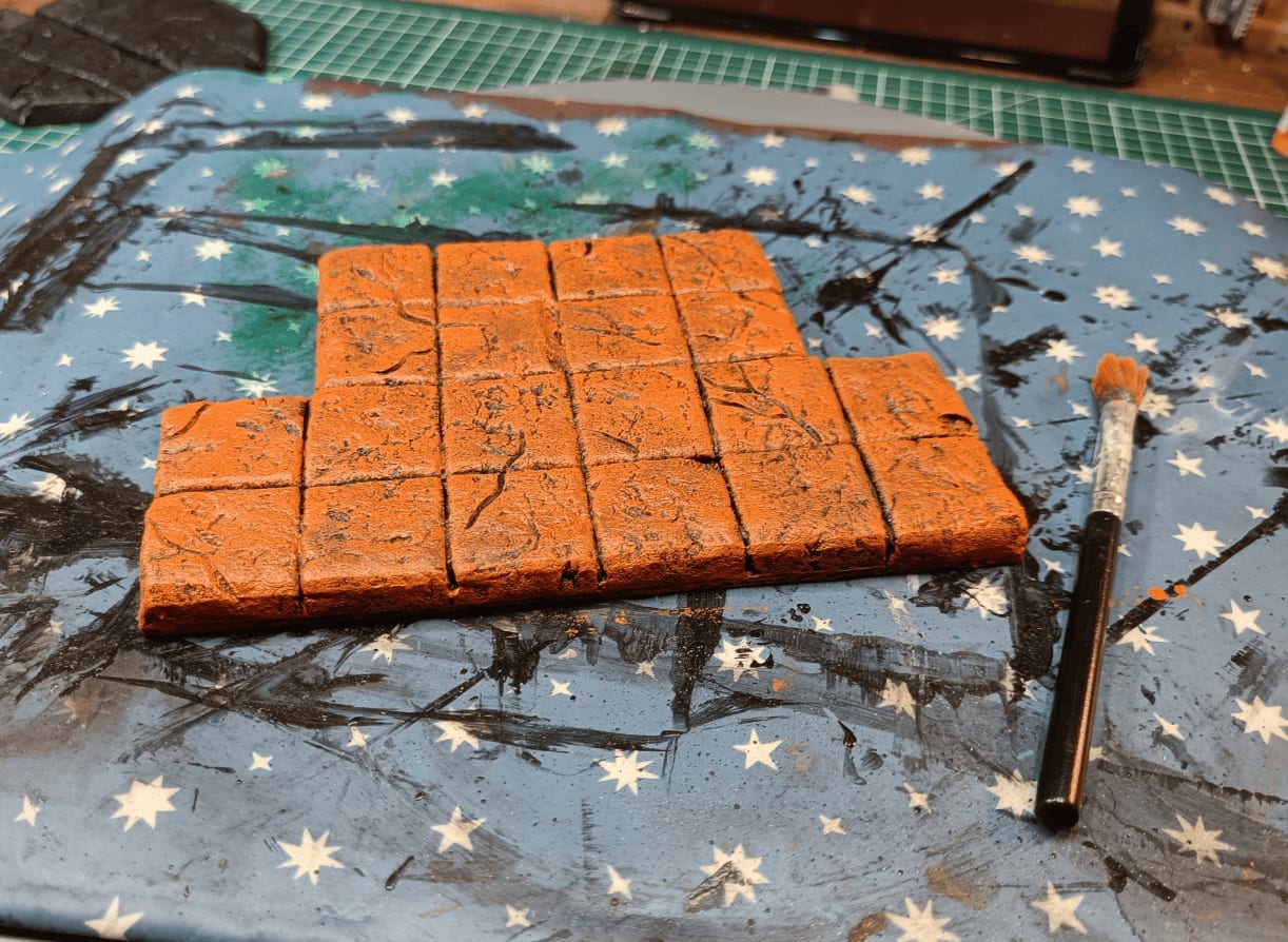 Bright orange overbrush looking weird but trusting the painting process