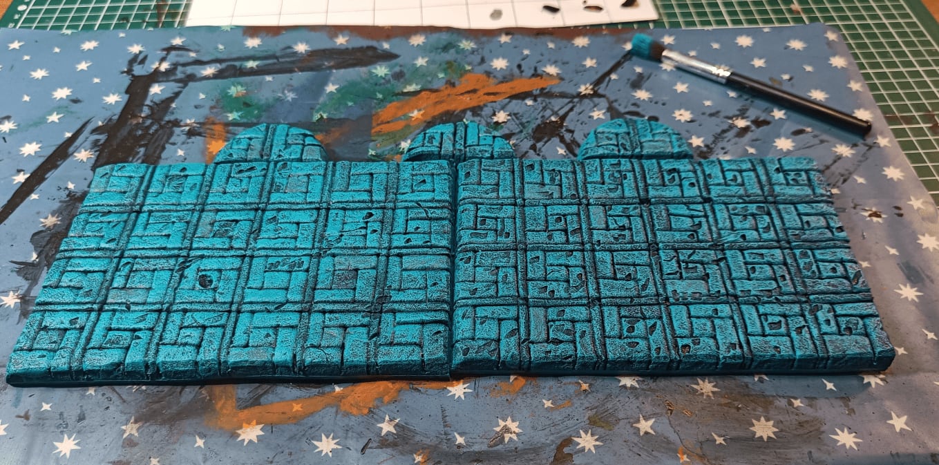 Overly busy room with complicated pattern and ugly damage that failed