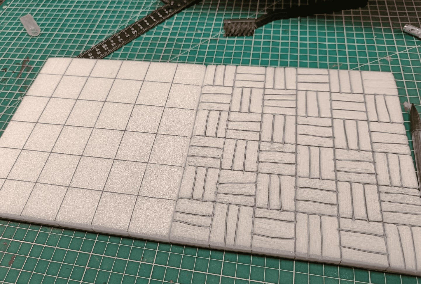 Large floorboard-style tiles being started