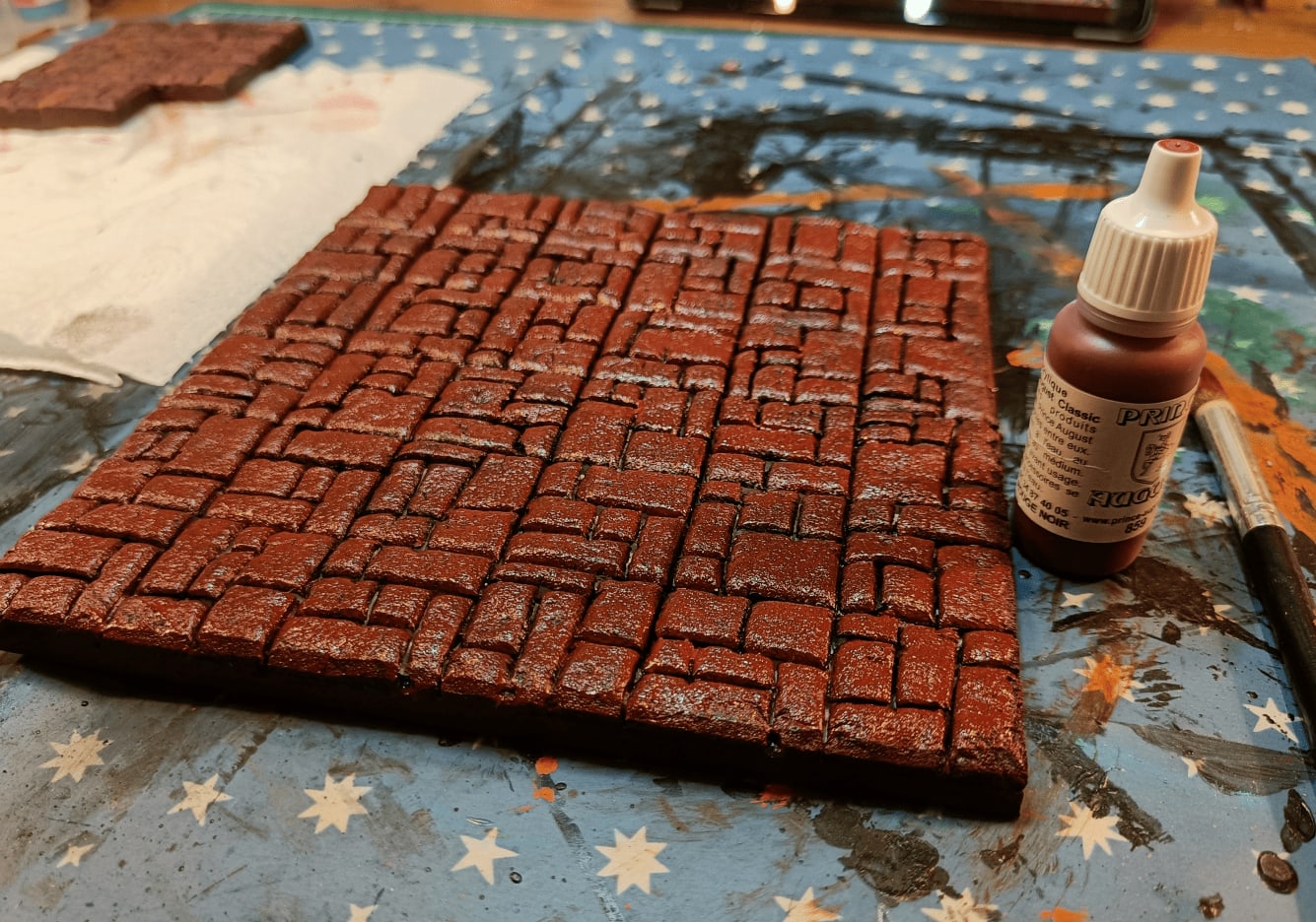 Red room tiles with strong red base coat