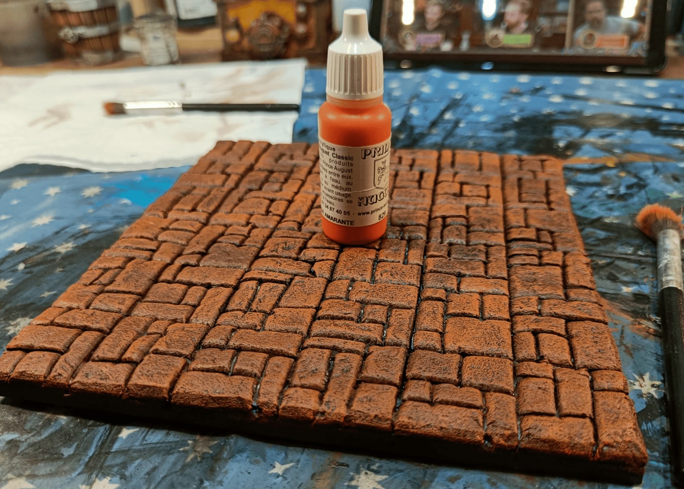 Orange drybrush over initially very red tiles