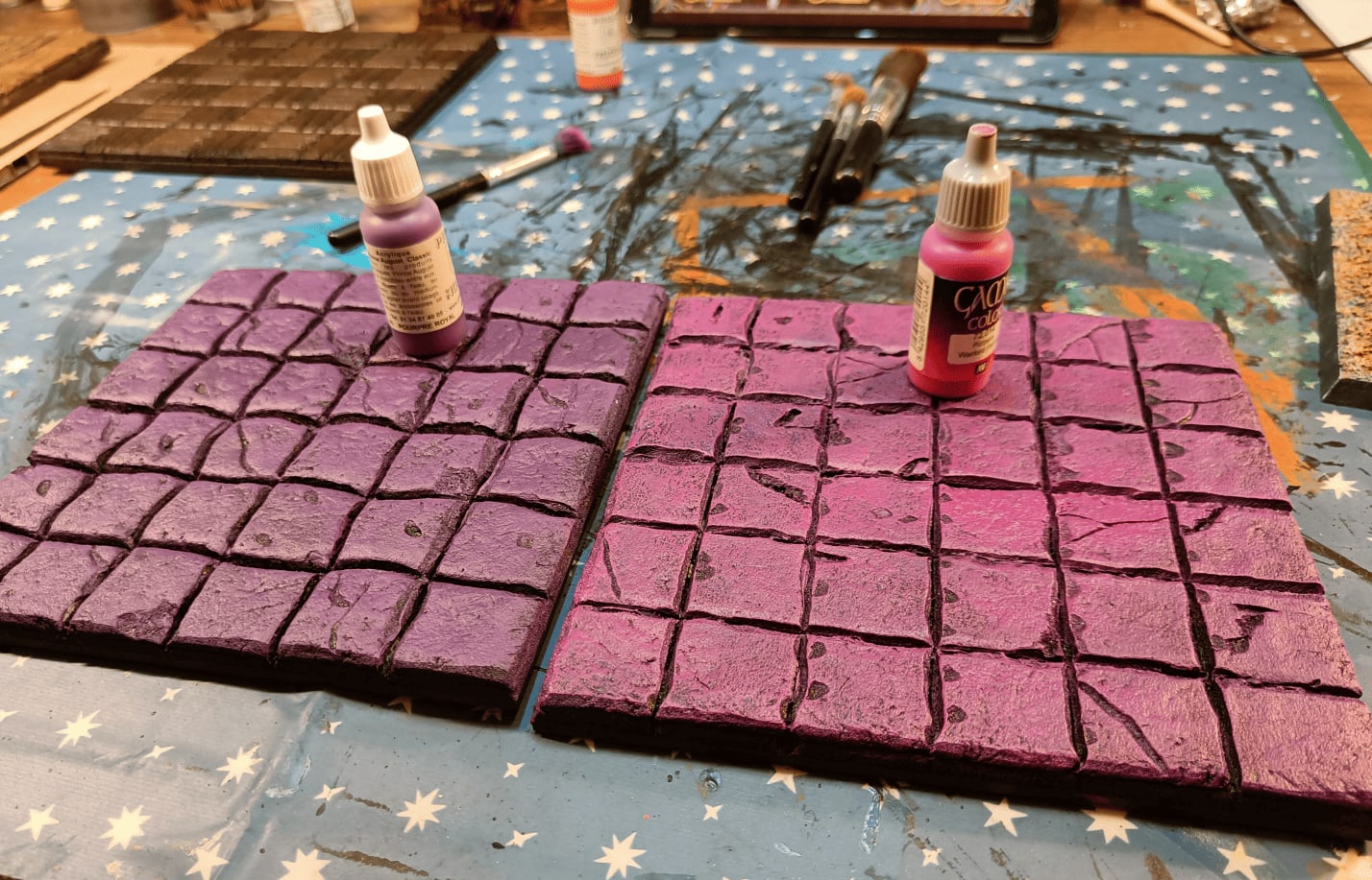 Pink drybrush added using vivid colors to be toned by wash