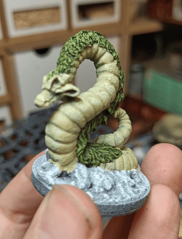 Metal snake with hair miniature used for sewer chase scene