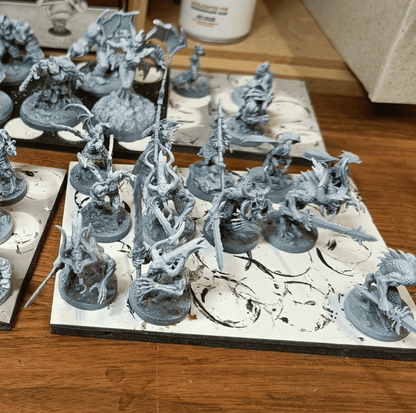 Mixed devil miniatures at priming stage from various sources