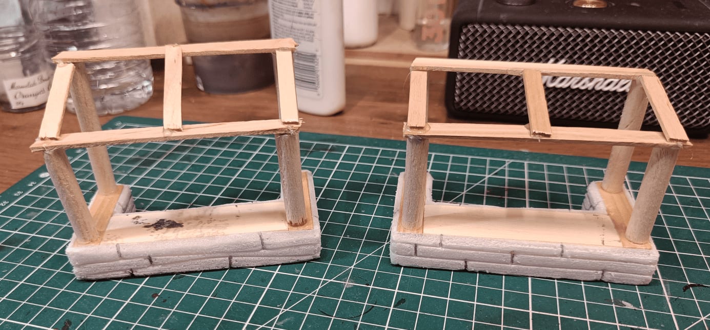 Stall roof construction using popsicle sticks and crepe paper