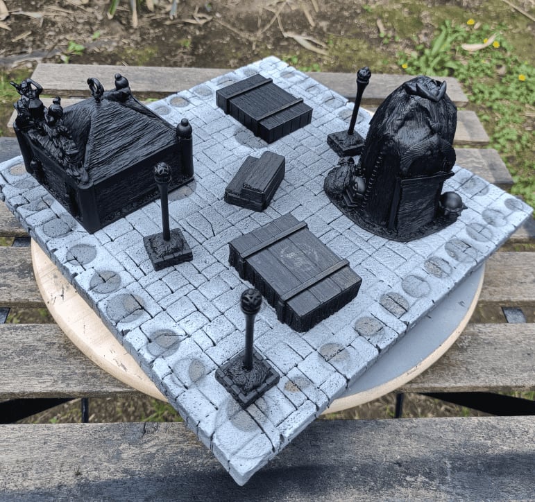 Outdoor priming session applying black primer coat