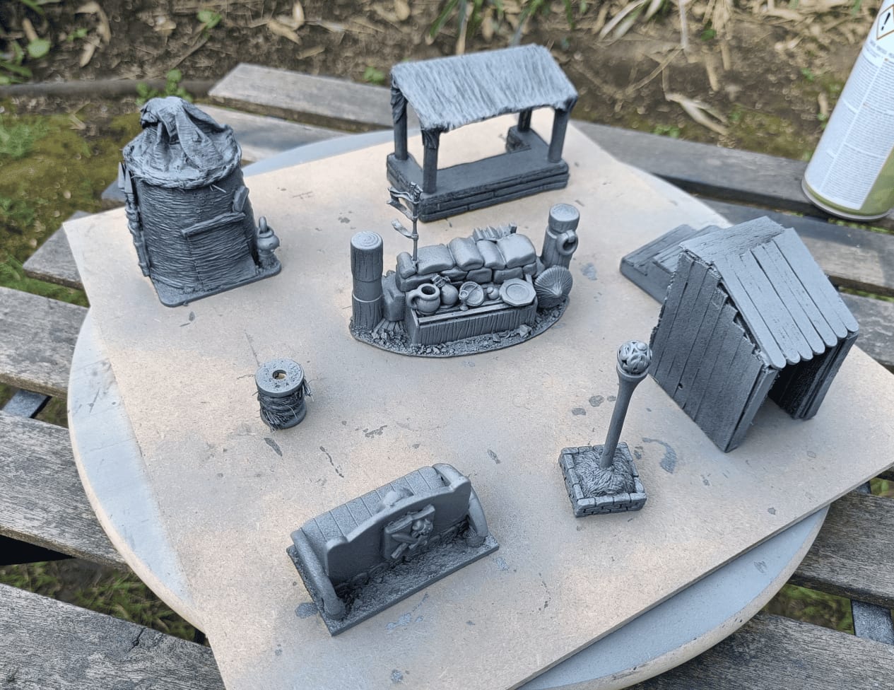 Elements with gray primer coat showing texture and relief